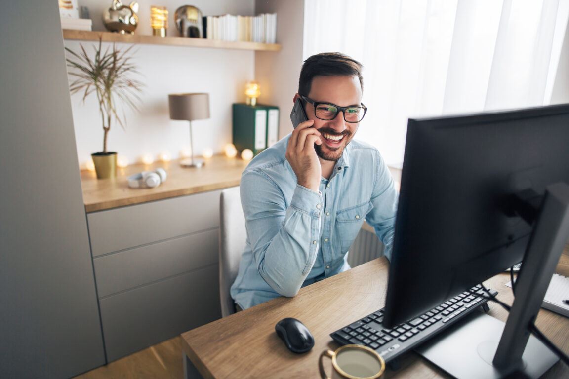 man working in his home office