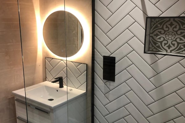 Vanity bathroom storage in tiled bathroom